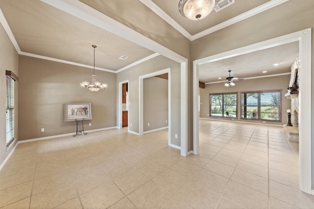 spare room featuring a fireplace, light tile patterned floors, ceiling fan with notable chandelier, and ornamental molding