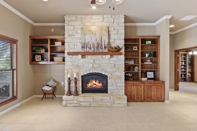 living room with light tile patterned flooring, crown molding, and a fireplace