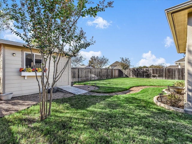 view of yard with a storage shed