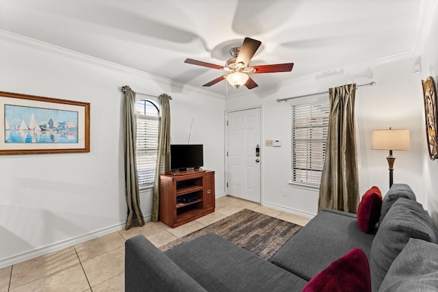 tiled living room featuring ceiling fan and crown molding