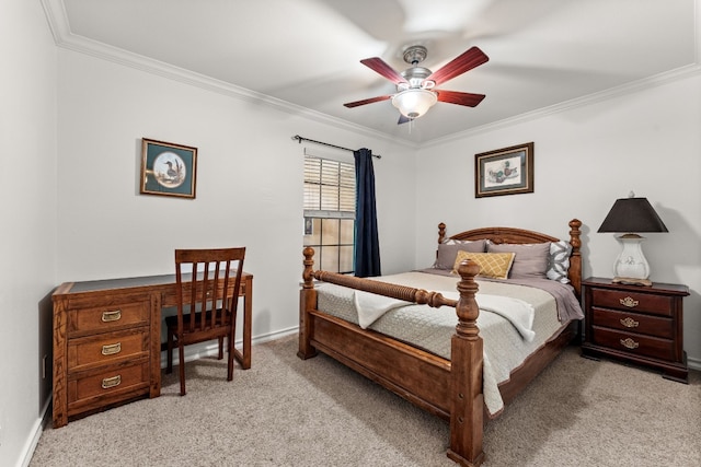 carpeted bedroom featuring ceiling fan and ornamental molding