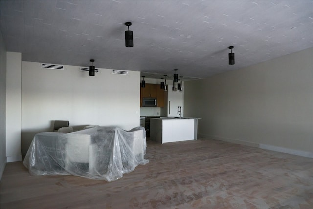 living room featuring sink