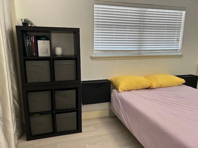 bedroom featuring light wood-type flooring