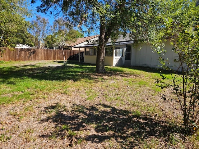 view of yard featuring fence