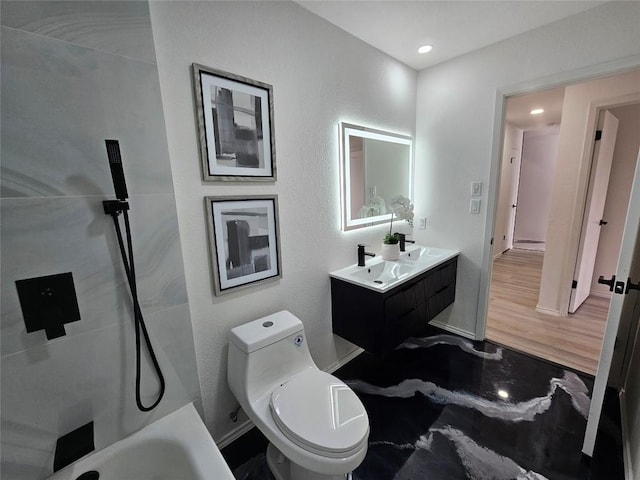 bathroom with toilet, double vanity, a washtub, and a sink