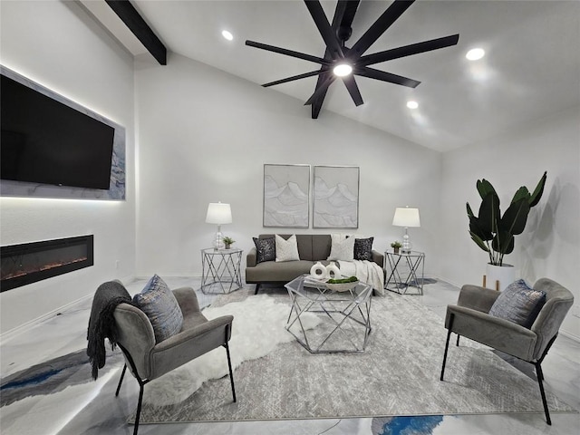 living area featuring a ceiling fan, a glass covered fireplace, vaulted ceiling with beams, marble finish floor, and recessed lighting