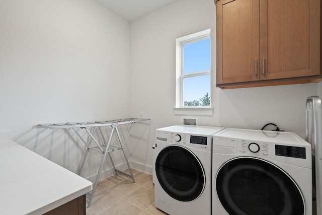 301 Miranda Way, Georgetown, TX 78633 - laundry area with cabinet space and washing machine and dryer