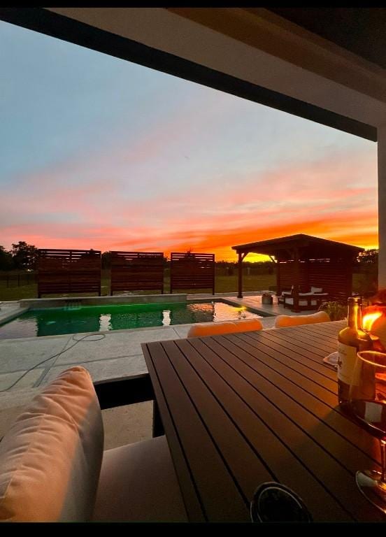 view of deck at dusk