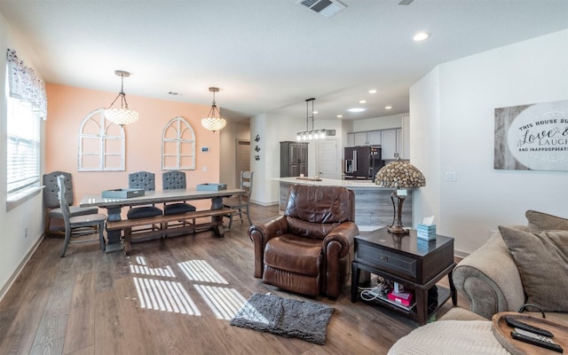 living room with dark hardwood / wood-style floors