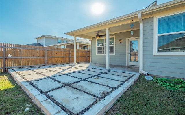 view of patio featuring ceiling fan