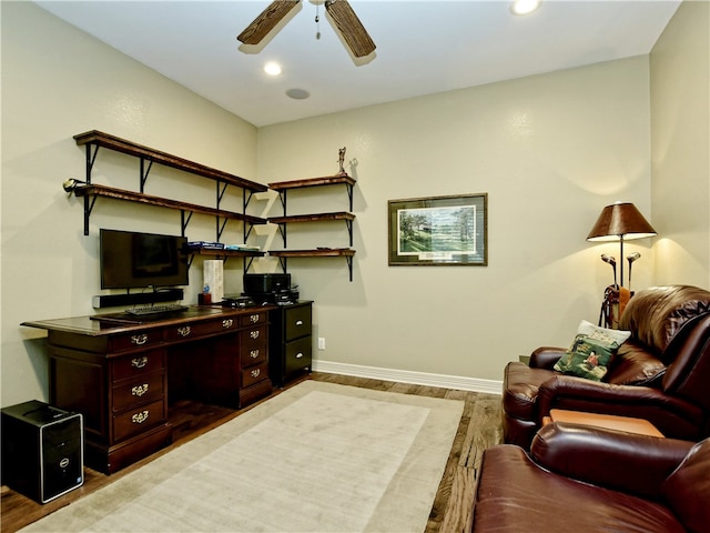 office featuring light wood-style floors, baseboards, a ceiling fan, and recessed lighting