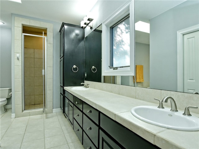 full bathroom with a sink, toilet, and a shower stall