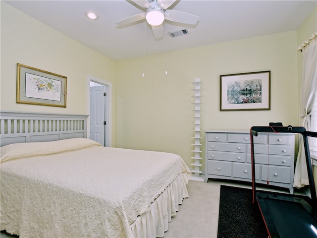 bedroom featuring a ceiling fan, light colored carpet, visible vents, and recessed lighting