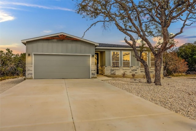 ranch-style home with a garage