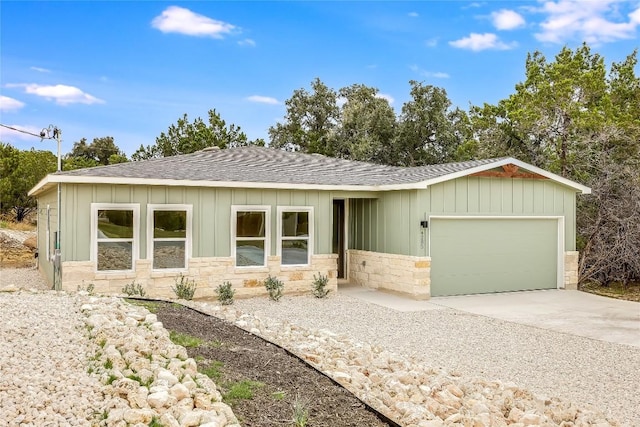 single story home featuring a garage