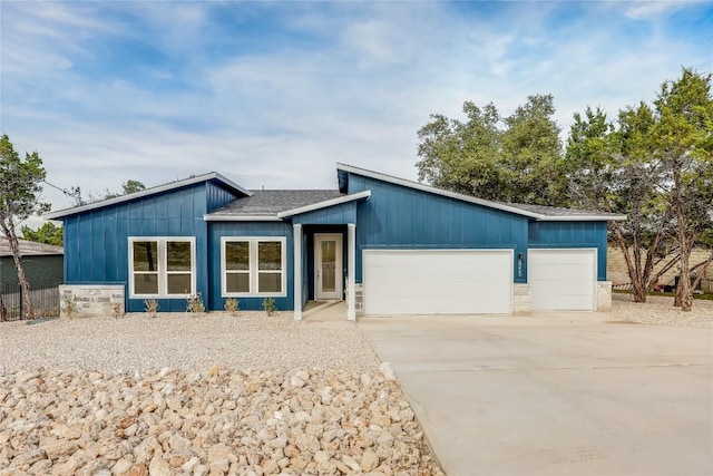 ranch-style home with a garage