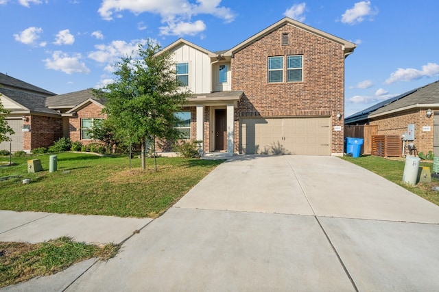 view of front of property featuring a garage and a front yard