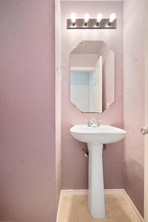 bathroom featuring tile patterned flooring