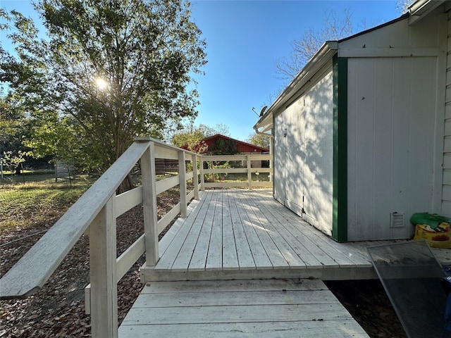 deck featuring a storage shed