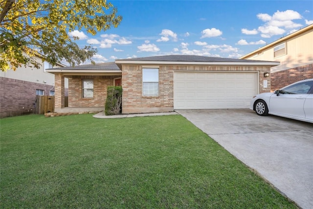 single story home featuring a garage and a front lawn