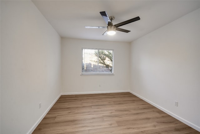 unfurnished room featuring ceiling fan and light hardwood / wood-style flooring