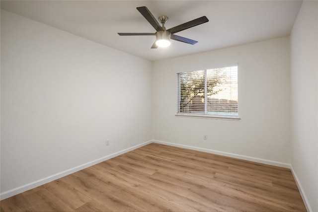 unfurnished room with ceiling fan and light hardwood / wood-style floors