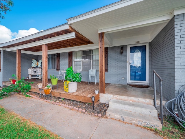 entrance to property with covered porch