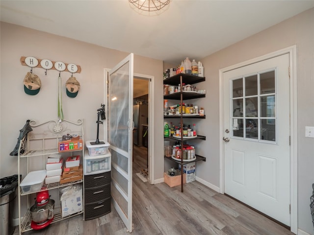 interior space with hardwood / wood-style flooring