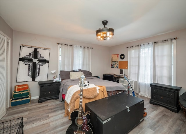 bedroom with light wood-type flooring