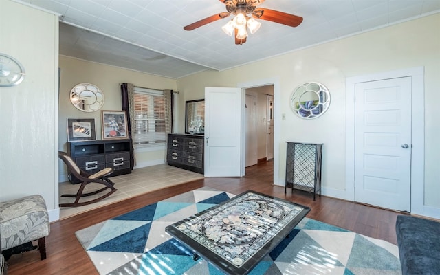 bedroom featuring ceiling fan and dark hardwood / wood-style flooring