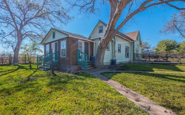 view of front facade with a front yard