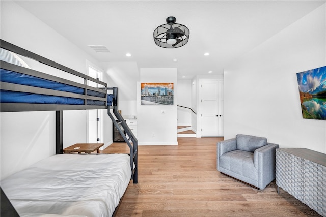 bedroom with light hardwood / wood-style floors