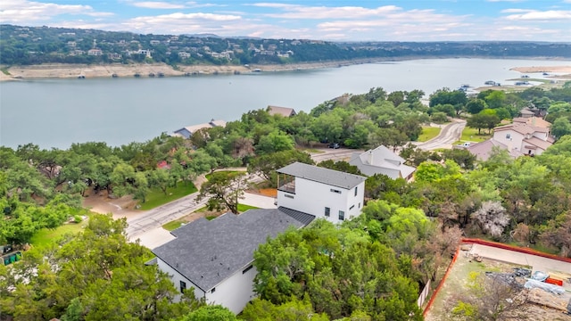 birds eye view of property featuring a water view