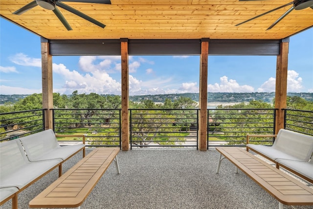 view of patio with ceiling fan, a balcony, and an outdoor hangout area