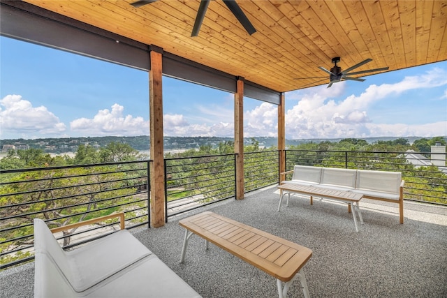 view of patio / terrace with an outdoor living space, a balcony, and ceiling fan