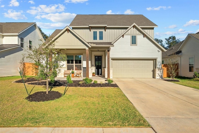 craftsman-style house featuring a porch, a garage, and a front yard