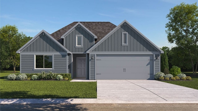 view of front of house with a front lawn and a garage