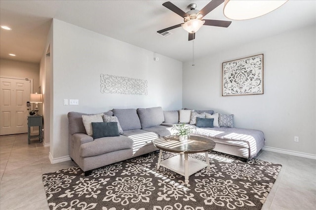 living room featuring ceiling fan and light tile patterned flooring