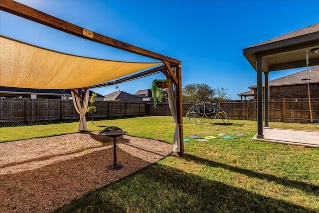 3925 Lyndsey Marie Ln, Pflugerville, TX 78660 - view of yard featuring a fenced backyard and a patio