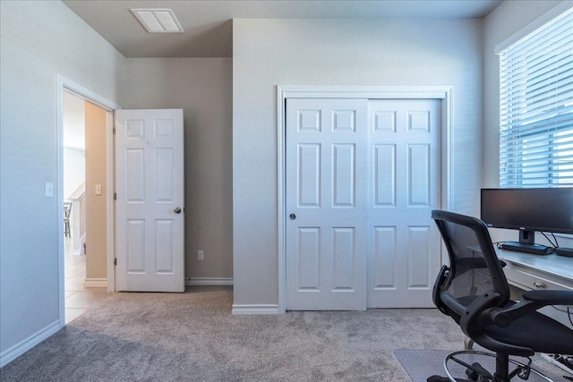 home office with light carpet