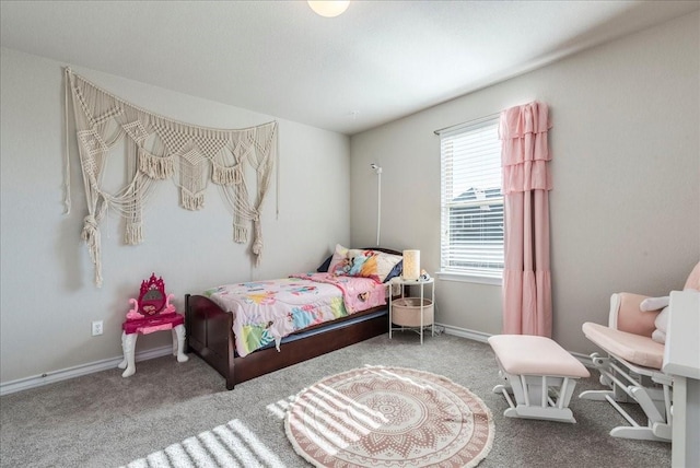 bedroom with light colored carpet