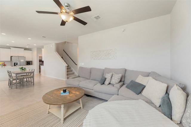 3925 Lyndsey Marie Ln, Pflugerville, TX 78660 - living room with light tile patterned flooring, visible vents, recessed lighting, a ceiling fan, and stairway