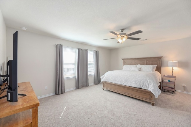 3925 Lyndsey Marie Ln, Pflugerville, TX 78660 - bedroom featuring baseboards, visible vents, light colored carpet, and ceiling fan
