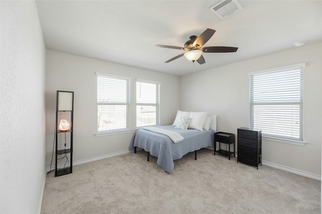 3925 Lyndsey Marie Ln, Pflugerville, TX 78660 - carpeted bedroom featuring baseboards, a ceiling fan, and visible vents