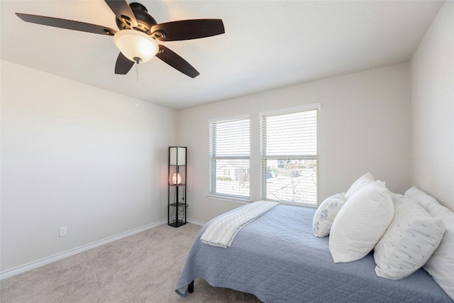3925 Lyndsey Marie Ln, Pflugerville, TX 78660 - bedroom featuring light carpet, baseboards, and ceiling fan