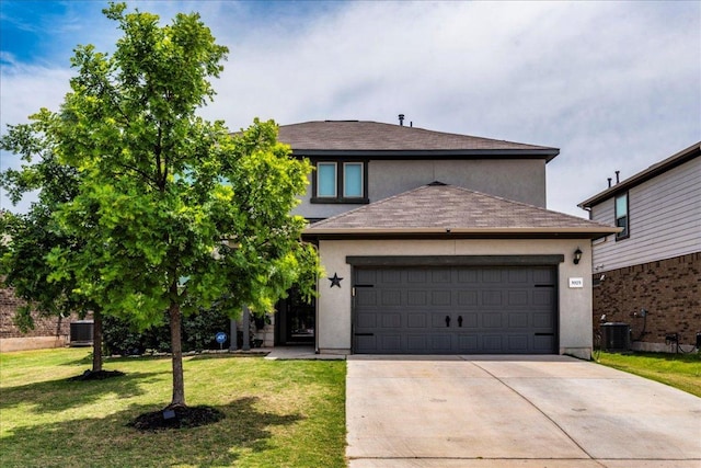 3925 Lyndsey Marie Ln, Pflugerville, TX 78660 - view of front facade with concrete driveway, stucco siding, a front yard, an attached garage, and roof with shingles