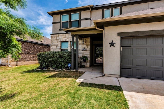 3925 Lyndsey Marie Ln, Pflugerville, TX 78660 - doorway to property with stone siding, a lawn, a garage, and stucco siding