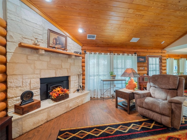 living room featuring lofted ceiling, wooden ceiling, hardwood / wood-style floors, and log walls