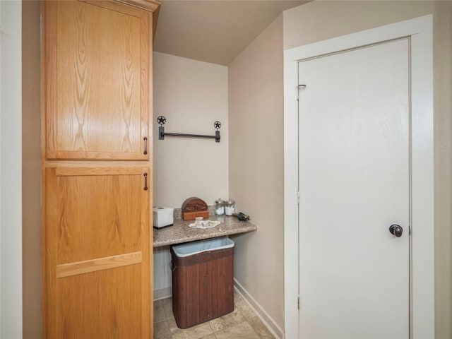 interior space with tile patterned floors