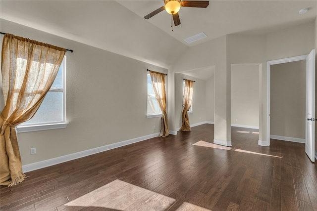 unfurnished room with dark hardwood / wood-style floors, ceiling fan, and lofted ceiling